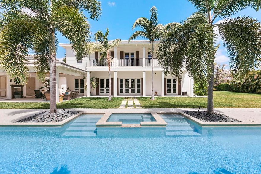 Double lot third house in from the intracoastal!  Enjoy intracoastal views and East breezes from your front porch and all rooms of this light, bright newly constructed Brittish Colonial Estate.The owners enlisted highly respected Palm Beach  architect  Patric Seagraves. The vision for  the home was multifaceted. It had to have the impact and grandeur of walking into a Four Seasons Resort highlighted by open floor plans, views to the intercostal, beautiful and lush curb appeal with the wow factor upon entering the home. A self contained retreat which is relaxing , bright  and inviting for  friends and family was key.