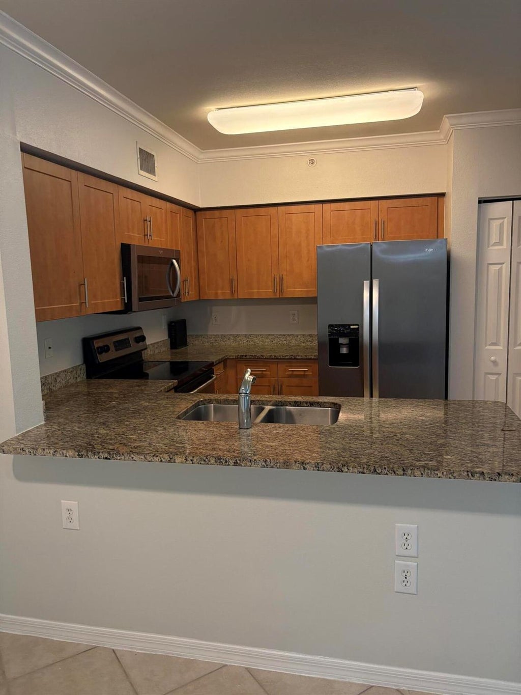 Photo of 6434 Emerald Dunes Drive #303, West Palm Beach, FL 33411 (MLS # R11106362)