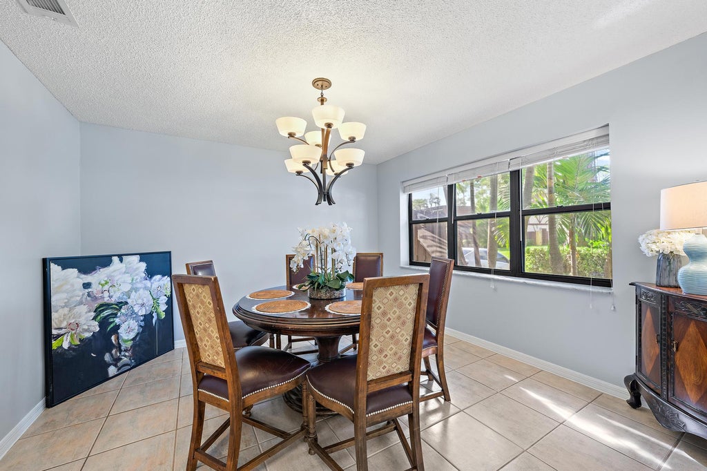 Photo of 148 WEYBRIDGE Circle #C, Royal Palm Beach, FL 33411 (MLS # B26078491)
