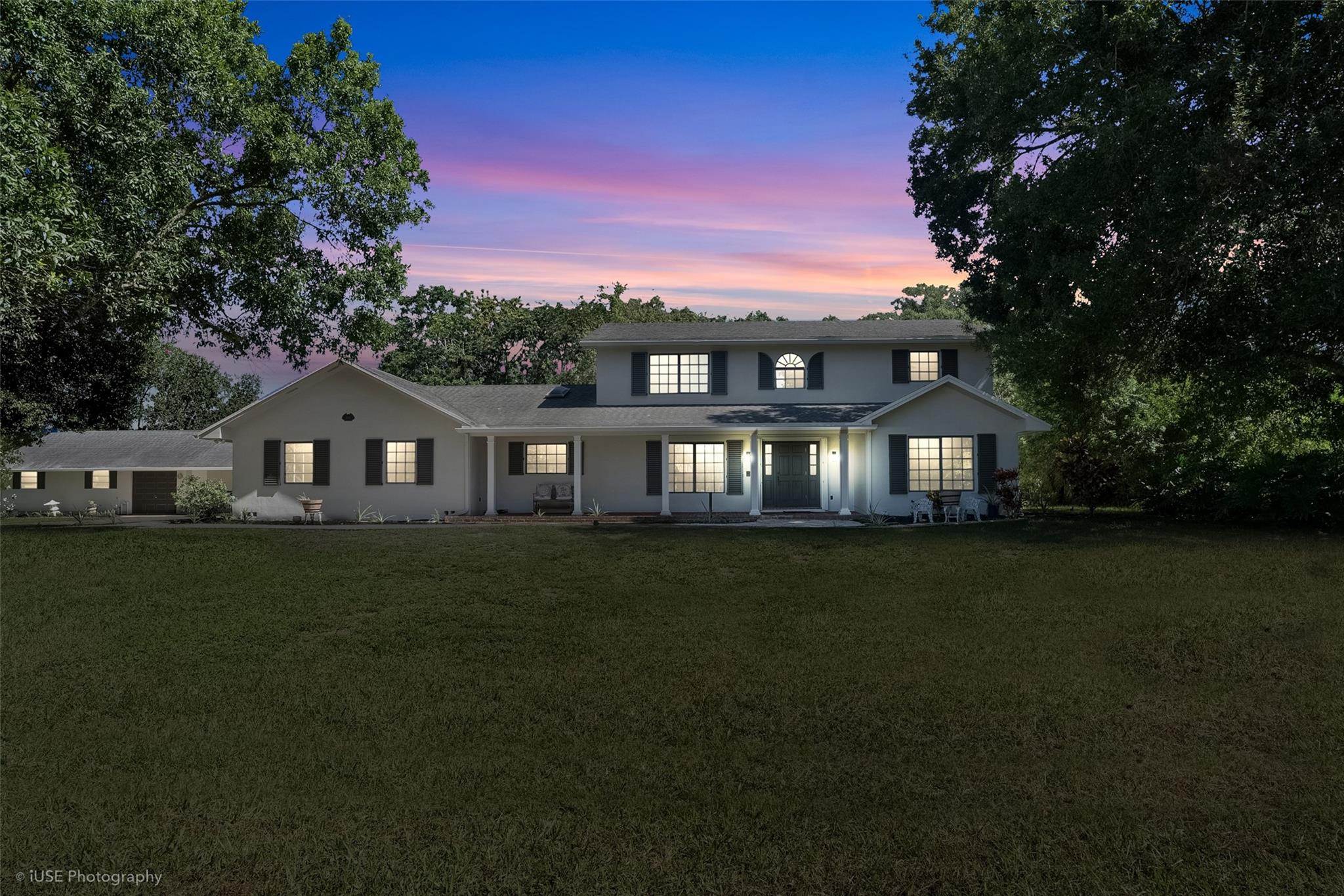 Beautiful Northern-Style home awaits in the Prestigious Plantation Acres...This impressive 2 story Custome-Built home offers... 5 Bedroom 3 & 1/2 Bathroom with Den/Office... lot of windows allowing ample natural light indoors... Formal Dining Room... Living room with Fireplace... Spaceious Kitchen with Wood cabinets... quartz Countertops and Glass backsplash... Stainless Steel appliances... laundryroom... Updated all Electrical Panel...
2 Owners suite... One on First floor... Spacious screened porch in back yard for gatherings with guest and family cookout to enjoy... Room for a Pool... 2 Car Garage... Free Standing Workshop with Carport... Fenced Boat/RV/Trailer pad... Large Driveway... Colonial Storm-rated Shutters for all Windows & Accordion Shutters for doors... Freshly Painted...