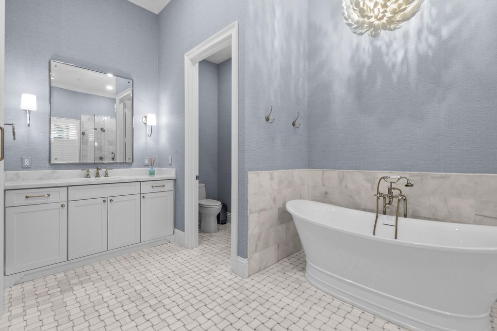 Photo of 111 Bilboa Drive, Jupiter, FL 33458 (MLS # B26016383)