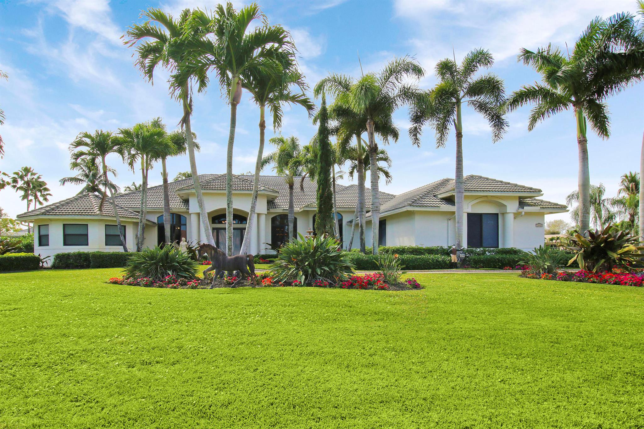 This beautiful 5 bedroom, 4 bathroom home is located in Aero Club, which is a private aeronautical community with a 4,000 foot paved runway. Situated on nearly an acre of land, you have plenty of room to build your custom hangar. Located on a taxi way, you're allowed to fly jets with max-gross take-off weight of 12,500 lbs. This community also offers a fueling station and plane parking. With so many upgrades, this split room design includes a spacious fully renovated kitchen, new roof, impact windows and doors, and all new marble flooring throughout. The outside is an entertainers dream that is complete with a screened in pool and patio, with a summer kitchen, gas/electric heated pool and spa, a 3 car garage. Located minutes away from all Equestrian venues, shopping, dining and A rated sc