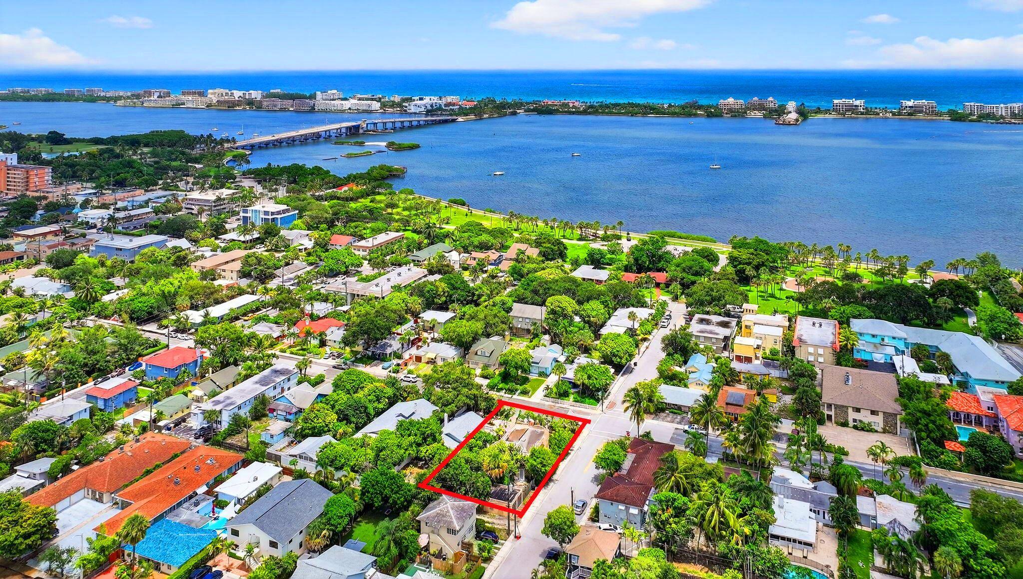 Investor Special! Appraised at $711,337 , now available for $499,900! This 4-bedroom, 2-bath house with 2-car garage is situated on a corner lot in the desirable South Palm Park Historic District of Lake Worth Beach. Just a one-mile walk to the beach, one block from the Intracoastal and parks, and only three blocks from downtown restaurants, bars, cafes, boutique shop, and more. Ideal for investors or visionary buyers -- the spacious yard is ready for expansion, a pool, or a complete rebuild. Renovated homes in this neighborhood have sold for top dollar. Original features include wooden floors, fireplace, arched windows, etc. Restore its charm or reimagine entirely. No HOA. This home offers huge potential for profit and is perfect for Airbnb rentals. Sold AS-IS with some repairs