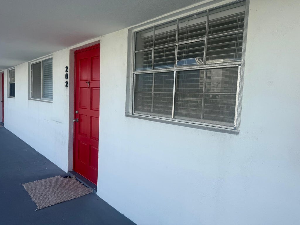 Photo of 402 Lake Shore Drive #202, West Palm Beach, FL 33403 (MLS # B26046040)