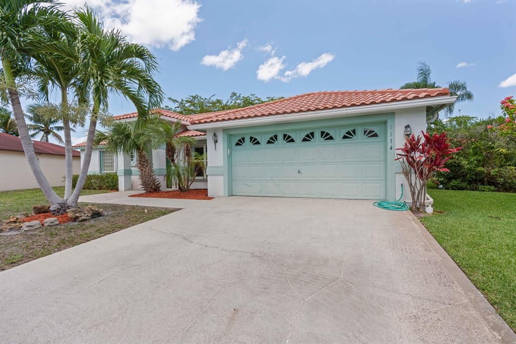 Photo of 1114 Hatteras Circle, Greenacres, FL 33413 (MLS # R10883801)