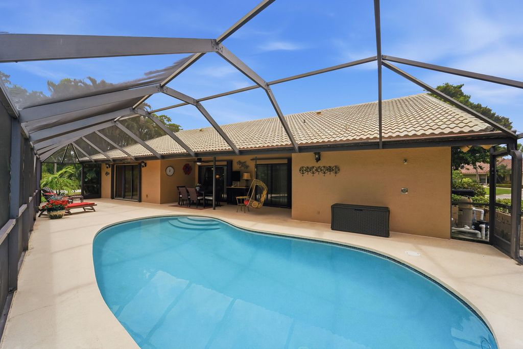 Photo of 2490 Lob Lolly Lane, Deerfield Beach, FL 33442 (MLS # B26020691)