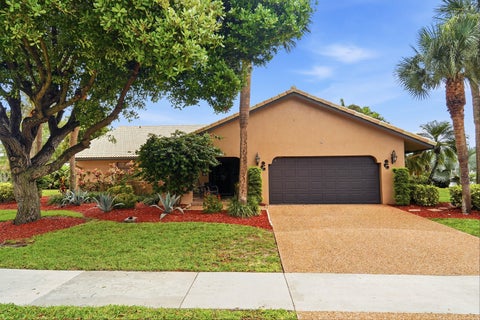 Photo of 2490 Deer Creek Lob Lolly Lane, Deerfield Beach, FL 33442 (MLS # B26020691)