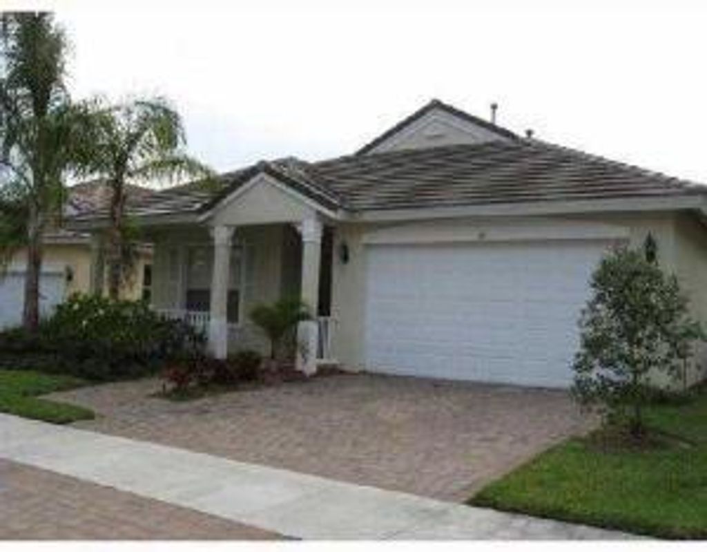 Photo of 117 NW Pleasant Grove Way, Port Saint Lucie, FL 34986 (MLS # R10791016)