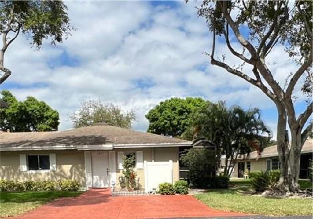 Photo of 8797 Echo Ln #D, Boca Raton, FL 33496 (MLS # F10370086)