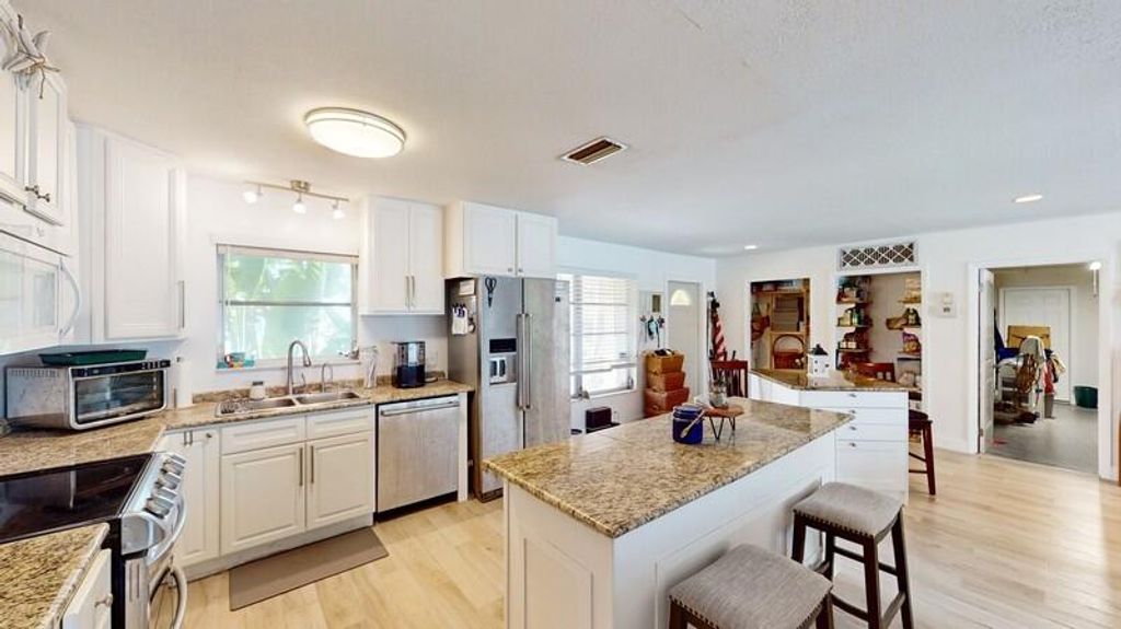 Photo of 528 SW Hidden River Avenue, Palm City, FL 34990 (MLS # R10990305)