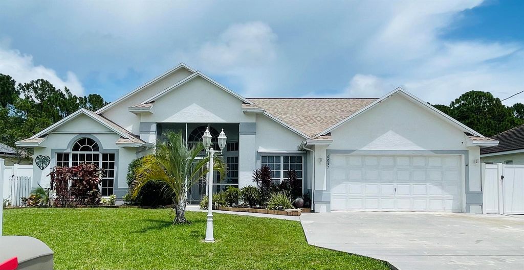 Photo of 6057 NW Wesley Road, Port St Lucie, FL 34986 (MLS # R10911383)