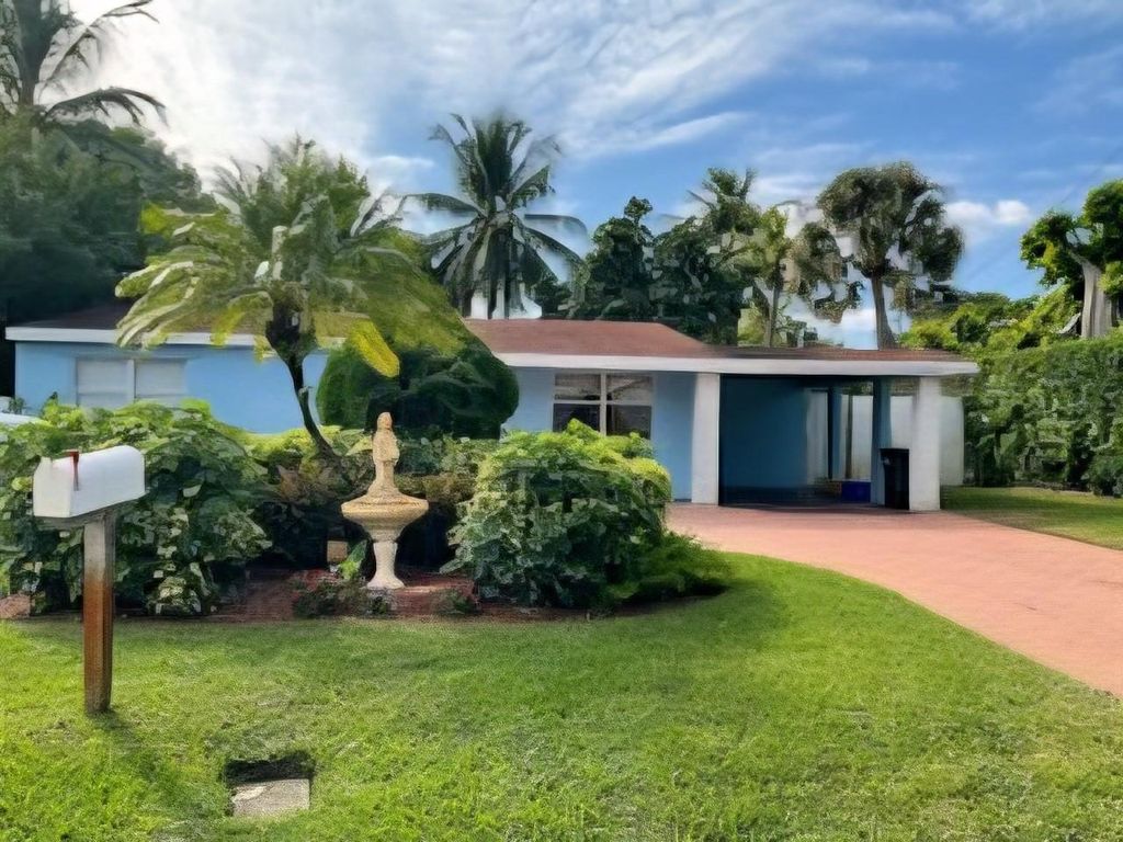 Photo of 946 Alamanda Rd, West Palm Beach, FL 33405 (MLS # F10534641)