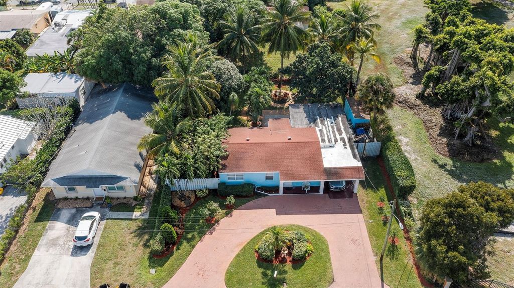 Photo of 946 Alamanda Road, West Palm Beach, FL 33405 (MLS # F10534641)