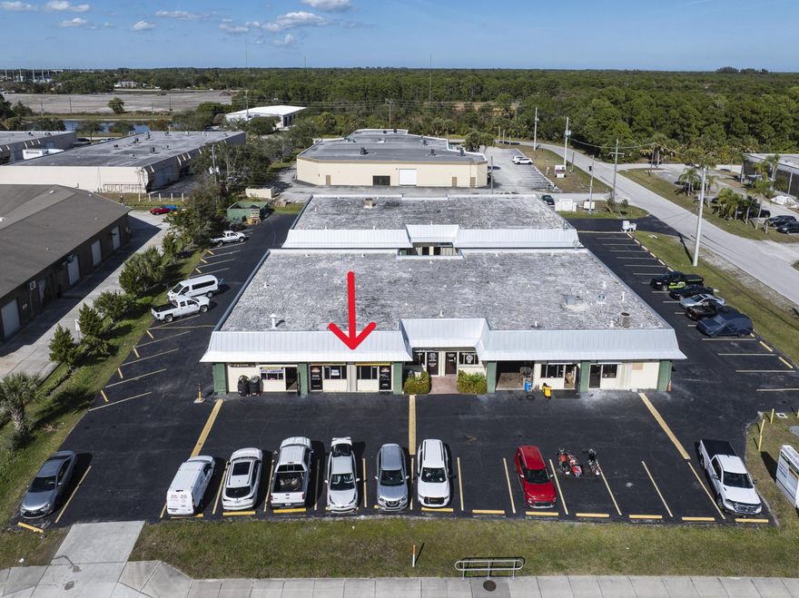Bright, open showroom with newly applied SunDek finished floors, ready for your finishing touches. This turnkey unit is ideal for a variety of uses, with zoning that supports warehouse and light industrial operations. Located in the established Village Green Drive warehouse district of east Port St. Lucie, Commerce Center 1 offers easy access to US-1, Crosstown Parkway, and Prima Vista Blvd, making it convenient for customers, employees, and deliveries. The project's mix of small-bay industrial users, ample parking, and professional appearance makes it an ideal home for contractors, service businesses, and light manufacturing or distribution