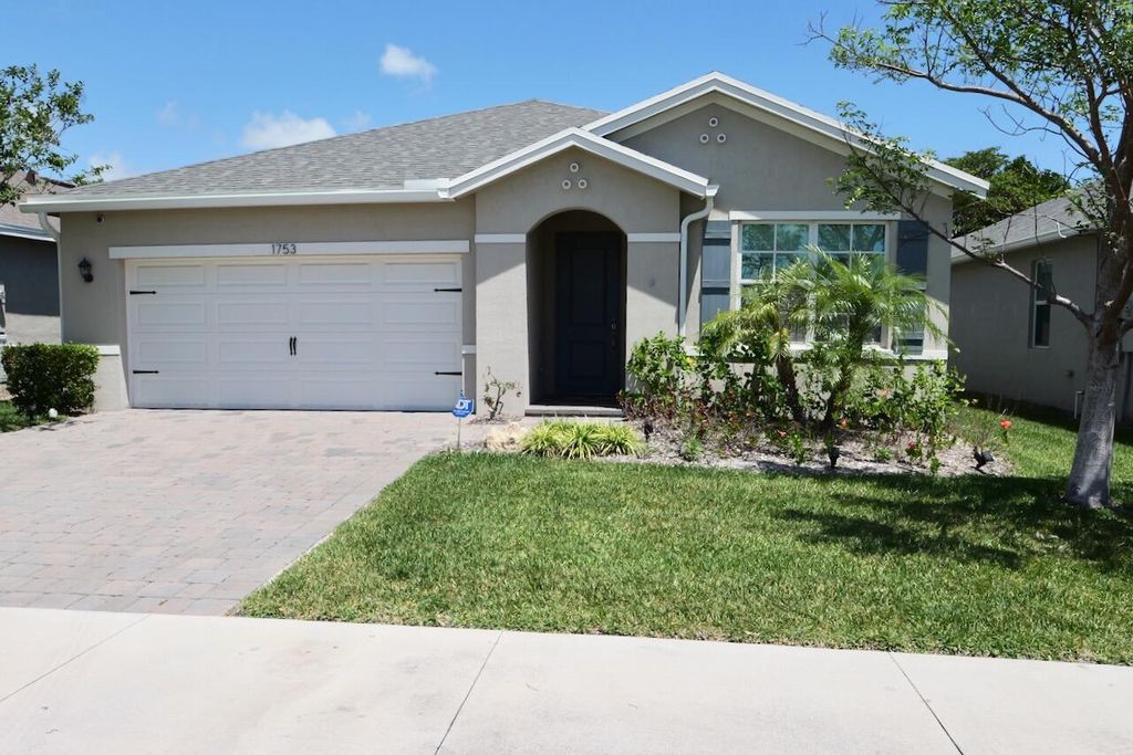 Photo of 1753 NE White Pine Terrace, Jensen Beach, FL 34957 (MLS # B26021741)