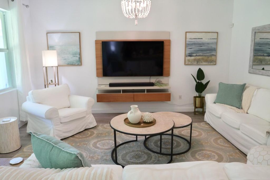 Photo of 1753 NE White Pine Terrace, Jensen Beach, FL 34957 (MLS # B26021741)