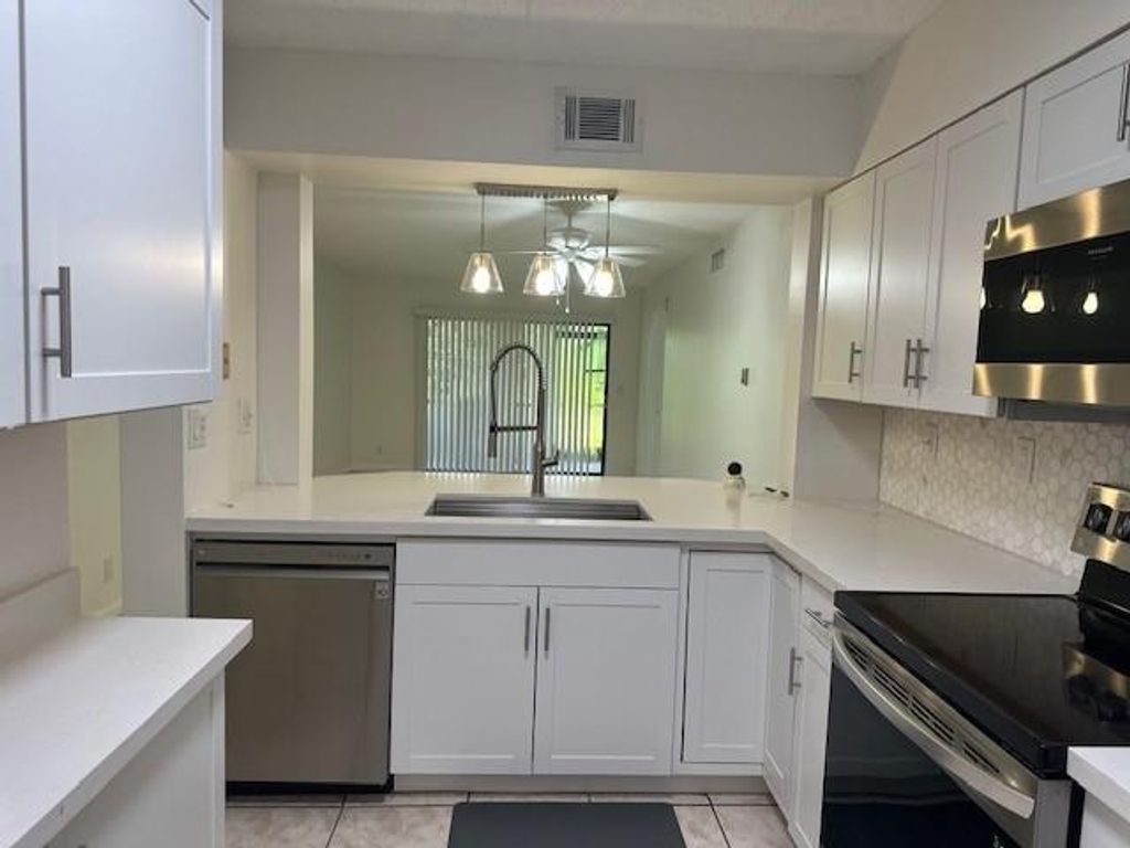 Photo of 3130 Millwood Terrace #115, Boca Raton, FL 33431 (MLS # F10519333)
