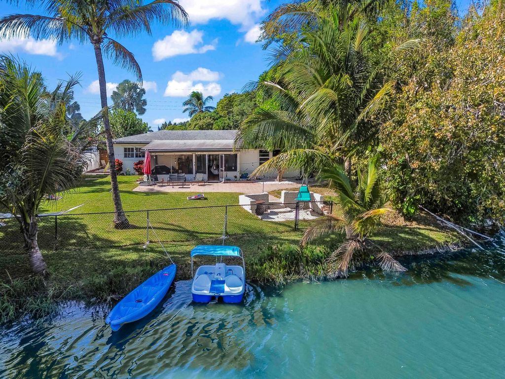 Photo of 1080 W Shore Drive, West Palm Beach, FL 33406 (MLS # R11156767)