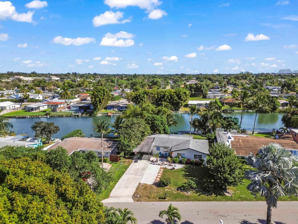 Photo of 1080 W Shore Drive, West Palm Beach, FL 33406 (MLS # R11156767)