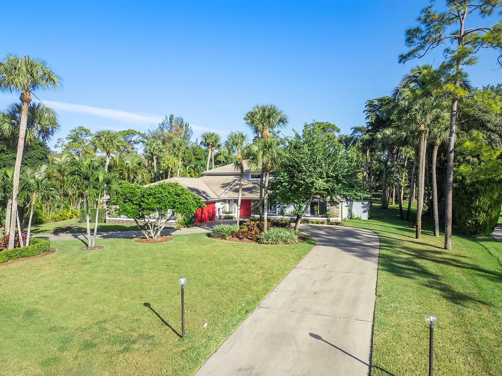 Photo of 13377 Doubletree Circle, Wellington, FL 33414 (MLS # R10935396)