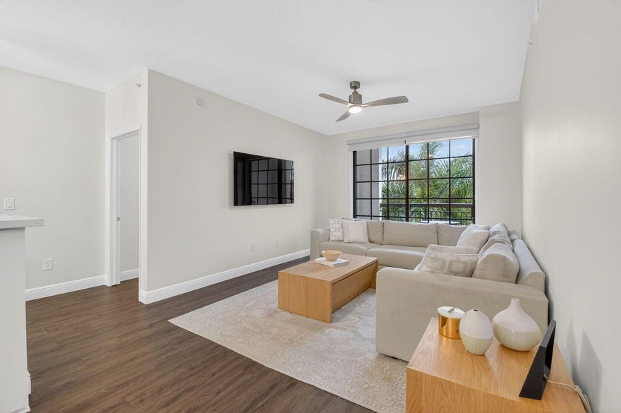 A ONE OF A KIND DESIGNER CONDO IN THE HEART OF DOWNTOWN BOCA RATON! WALK INTO A BRIGHT OPEN FLOOR PLAN WITH SPLIT EN SUITE BEDROOMS. SOUTHERN EXPOSURE WITH PRIVATE BALCONY. GORGEOUS WOOD FLOORING THROUGHOUT. THE NICEST TWO BEDROOM FLOOR PLAN IN THE BUILDING. THE KITCHEN HAS BEEN COMPLETELY REMODELED WITH NEW COUNTER TOPS, EXTRA LARGE SINK, BACK SPLASH, STAINLESS STEEL GE APPLIANCES, & CUSTOM WHITE CABINETS. THE PRIMARY BEDROOM HAS TWO SPACIOUS CUSTOM CLOSETS AND REMODELED BATHROOM WITH ITALIAN MARBLE THROUGHOUT, GLASS SHOWER DOOR, RAIN SHOWERHEAD, AND CUSTOM VANITY. THE GUEST ROOM HAS A SPACIOUS WALK IN CLOSET AND GUEST BATH HAS BEEN REMODELED WITH MARBLE, GLASS SHOWER, AND CUSTOME VANITY. ALL NEW LIGHTING FIXTURES & FANS. NEWER GE WASHER & DRYER WHICH IS ENCLOSED WITH BUILT IN SHELVES.