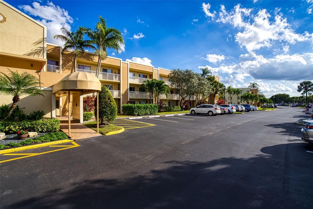 Photo of 7334 Devon Dr #108, Tamarac, FL 33321 (MLS # F10541918)