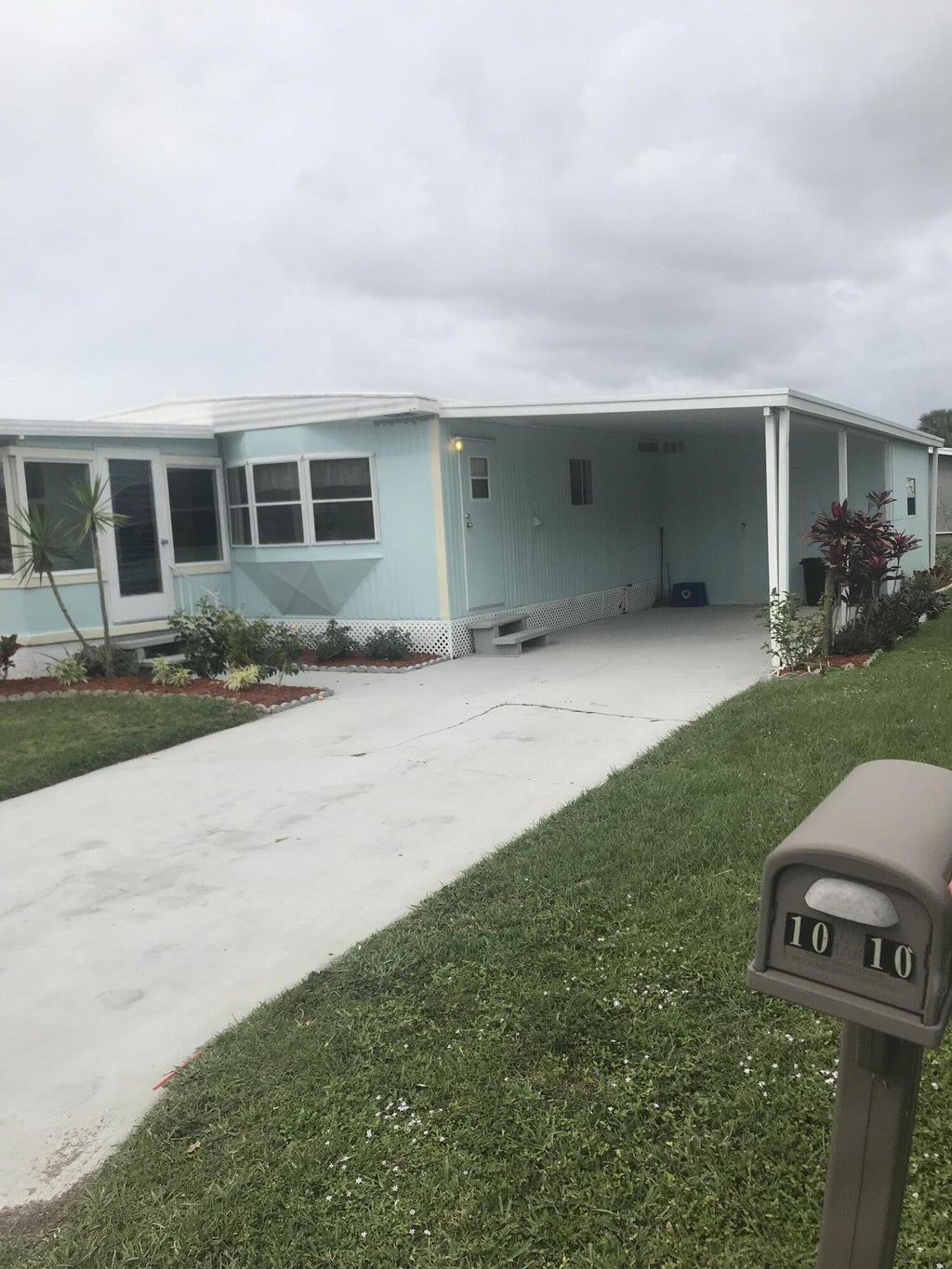 Photo of 8 Brisa Lane, Port Saint Lucie, FL 34952 (MLS # R10954395)