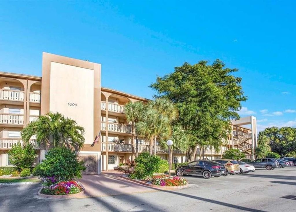 Photo of 1603 Abaco Drive #G4, Coconut Creek, FL 33066 (MLS # F10545969)