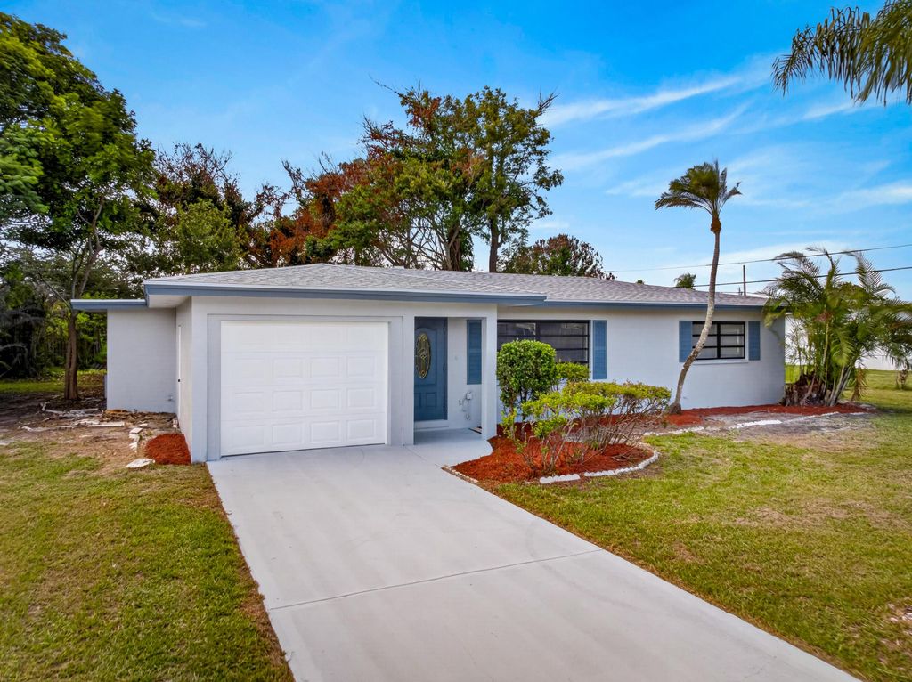 Photo of 779 Lomas Street, Port Saint Lucie, FL 34952 (MLS # B26043646)