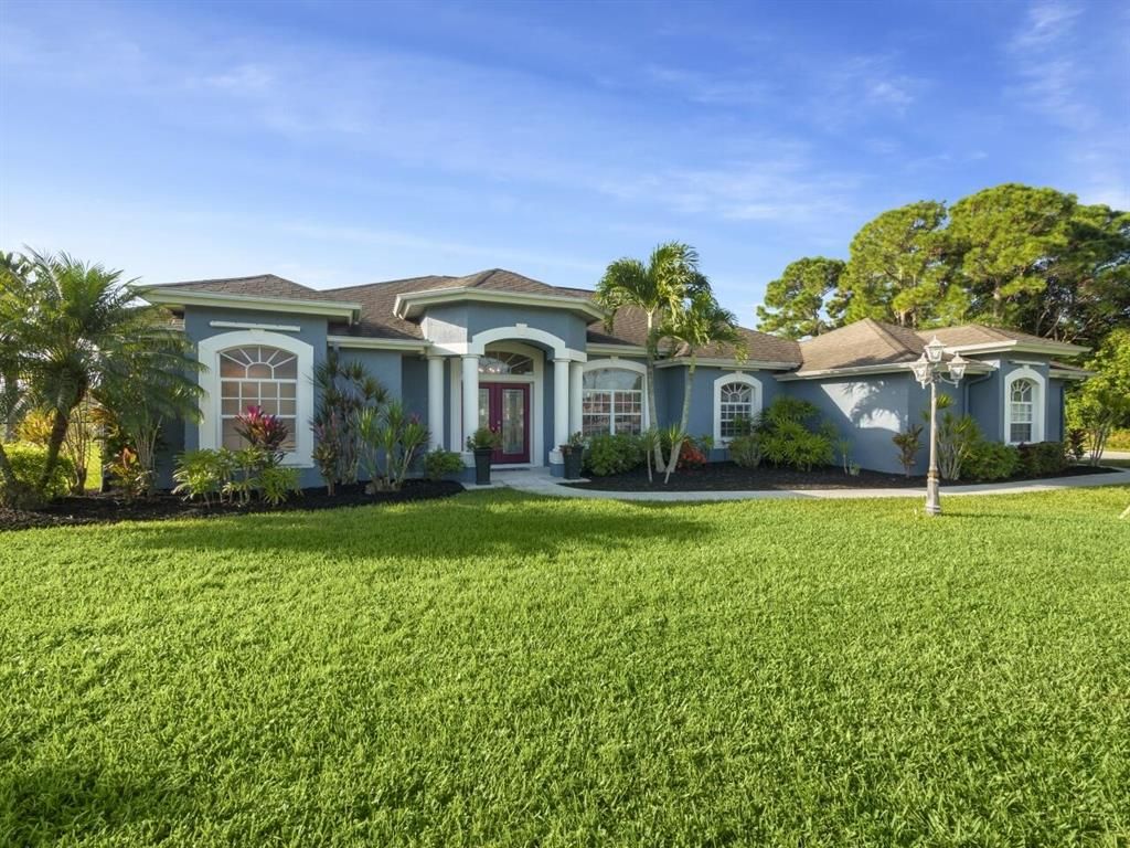 Photo of 1260 SW Jericho Avenue, Port Saint Lucie, FL 34953 (MLS # R10752134)