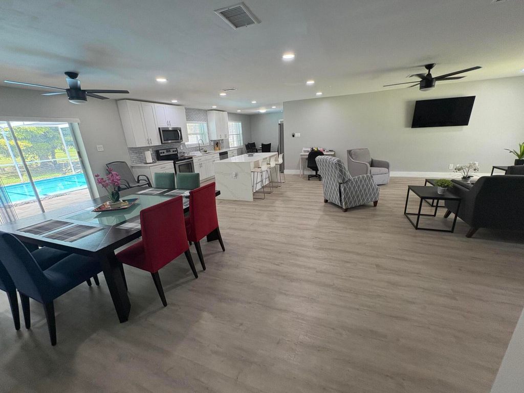 Photo of 1401 NW 75th Terrace, Plantation, FL 33313 (MLS # B26012849)