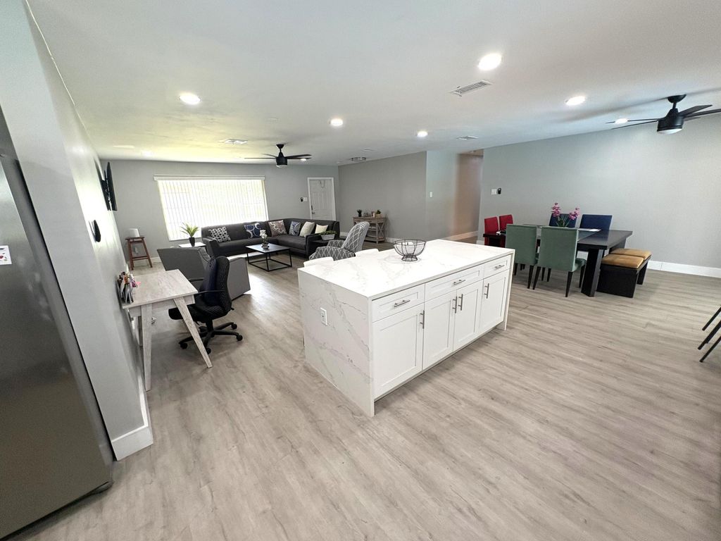 Photo of 1401 NW 75th Terrace, Plantation, FL 33313 (MLS # B26012849)