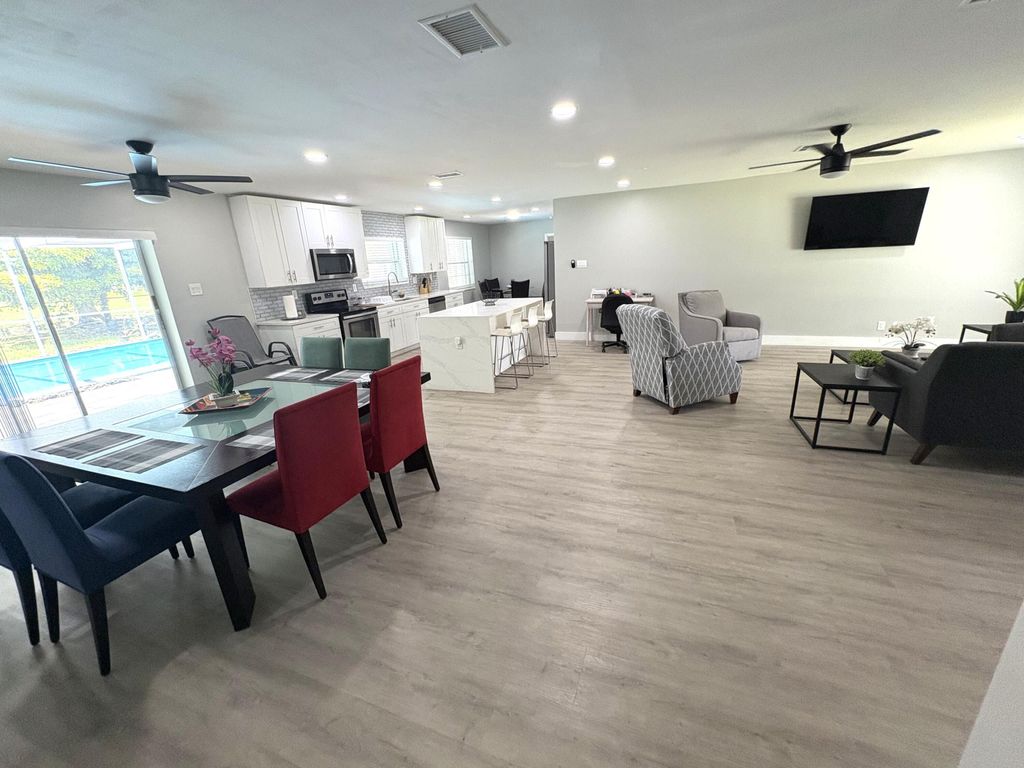 Photo of 1401 NW 75th Terrace, Plantation, FL 33313 (MLS # B26012849)