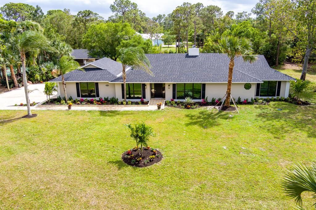 Photo of 10904 SW Hawkview Circle, Stuart, FL 34997 (MLS # R10705155)