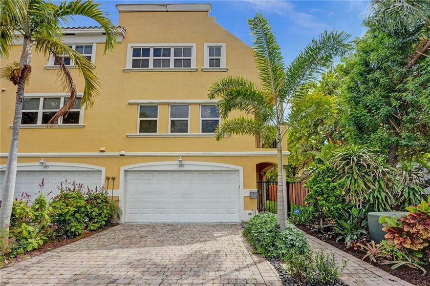 Large Townhome with all impact windows & doors and Large 2 car garage w/driveway in convenient Victoria Park, only minutes to downtown & the beach. Only 2 blocks from Holiday Pk. This desirable end unit 3BD/3.5BA TH is beaming with beautiful, natural light and 2 master suites. Even 2nd BDRM is en-suite. One of Master suites at entry level-perfect for roommate! This room walks out to private patio with wonderful space for relaxing, grilling and uniquely private. Nice size side yard  perfect for pets! Main living area is open, bright and perfect for entertaining. Kitchen has been opened to flow to dining and living spaces. Porcelain wood look tile in Living Area & Top of the line Viking appliances. Whole house water filter, central vac and much more! New Roofs & Building Paint coming soon!