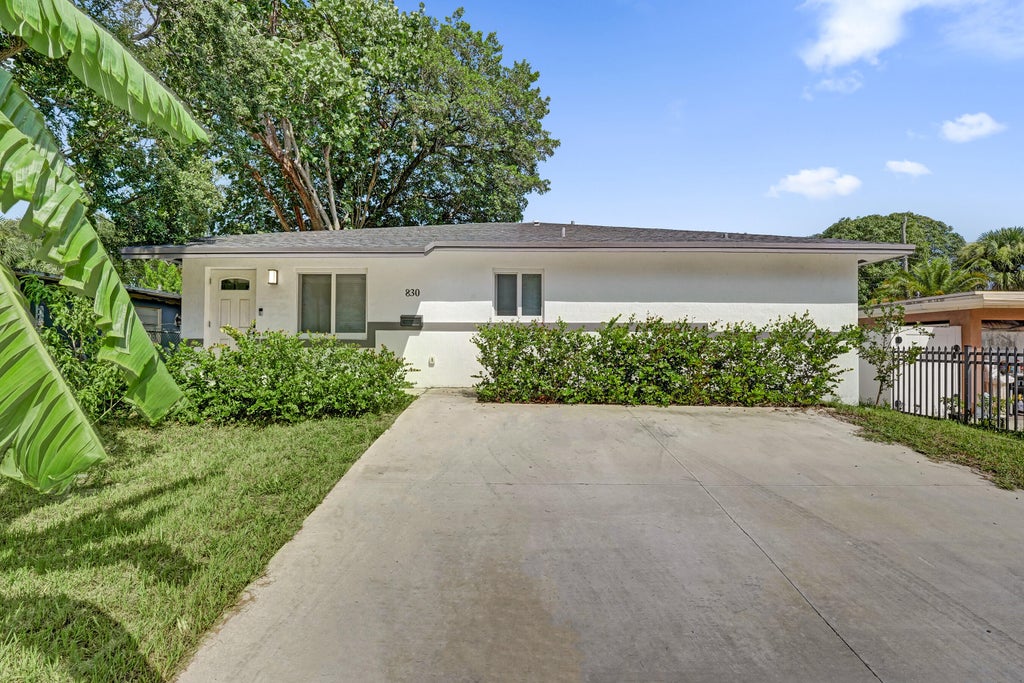 Photo of 830 NW 19TH Street, Fort Lauderdale, FL 33311 (MLS # B26077709)