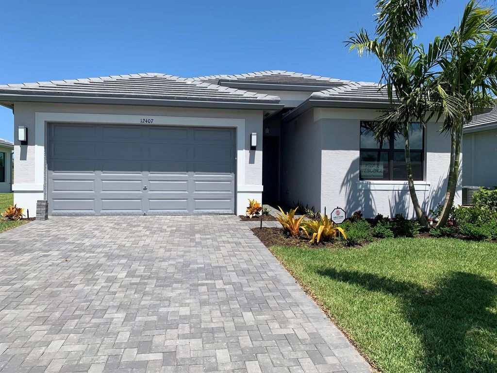 Photo of 12407 SW Blue Mangrove Parkway, Port Saint Lucie, FL 34987 (MLS # R10992239)