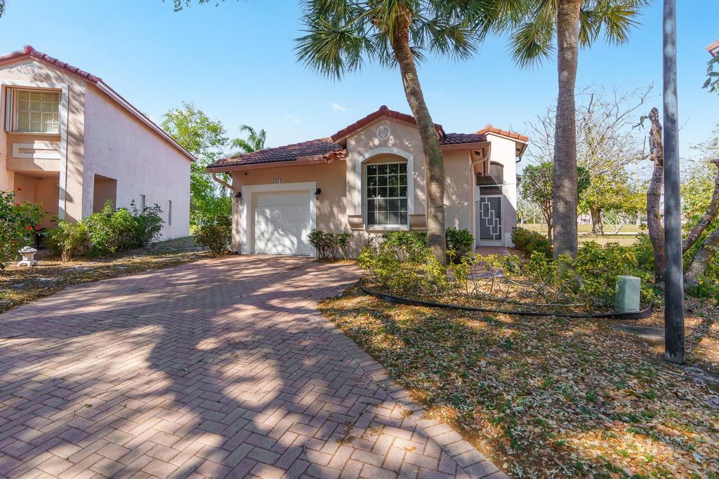 Photo of 3954 NW 63rd Terrace, Coral Springs, FL 33067 (MLS # F10491769)