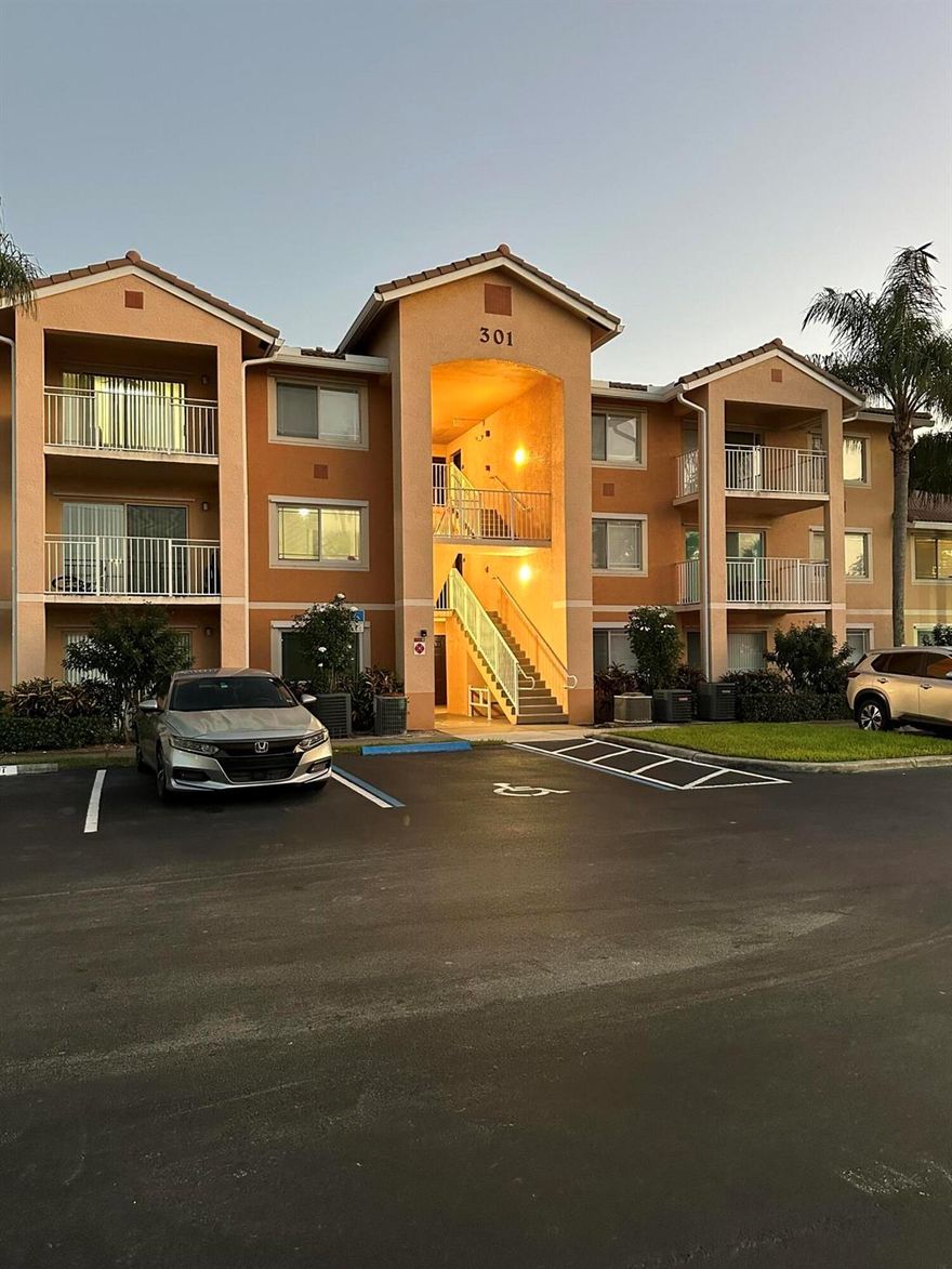 Spacious first floor two bedroom condo with lake view in a gated community. recently painted wit all tile flooring, granite counters in kitchen and bathrooms, stainless steel appliances, washer and dryer, rent includes water and sewer, extra storage closet, resort style clubhouse, pool, fitness center, tennis, close to shopping, restaurants and more.