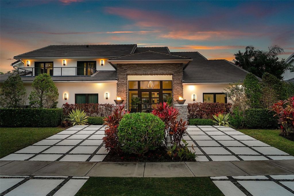 Photo of 737 NE Boca Bay Colony Drive, Boca Raton, FL 33487 (MLS # F10545677)