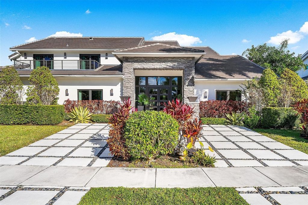 Photo of 737 NE Boca Bay Colony Drive, Boca Raton, FL 33487 (MLS # F10545677)