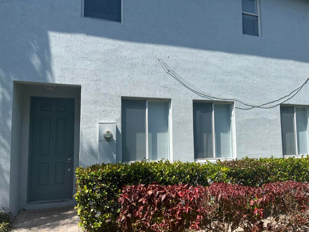 Photo of 3231 LAUREL RIDGE Circle, Riviera Beach, FL 33404 (MLS # B26068568)