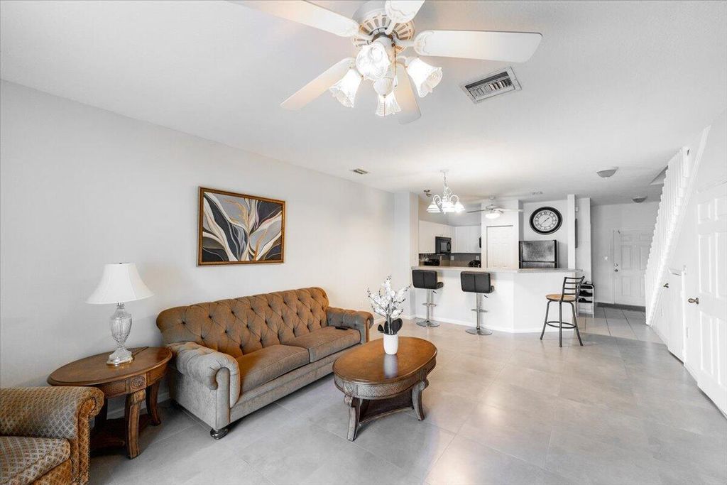 Photo of 5207 SE Mariner Gardens Circle, Stuart, FL 34997 (MLS # R10929334)