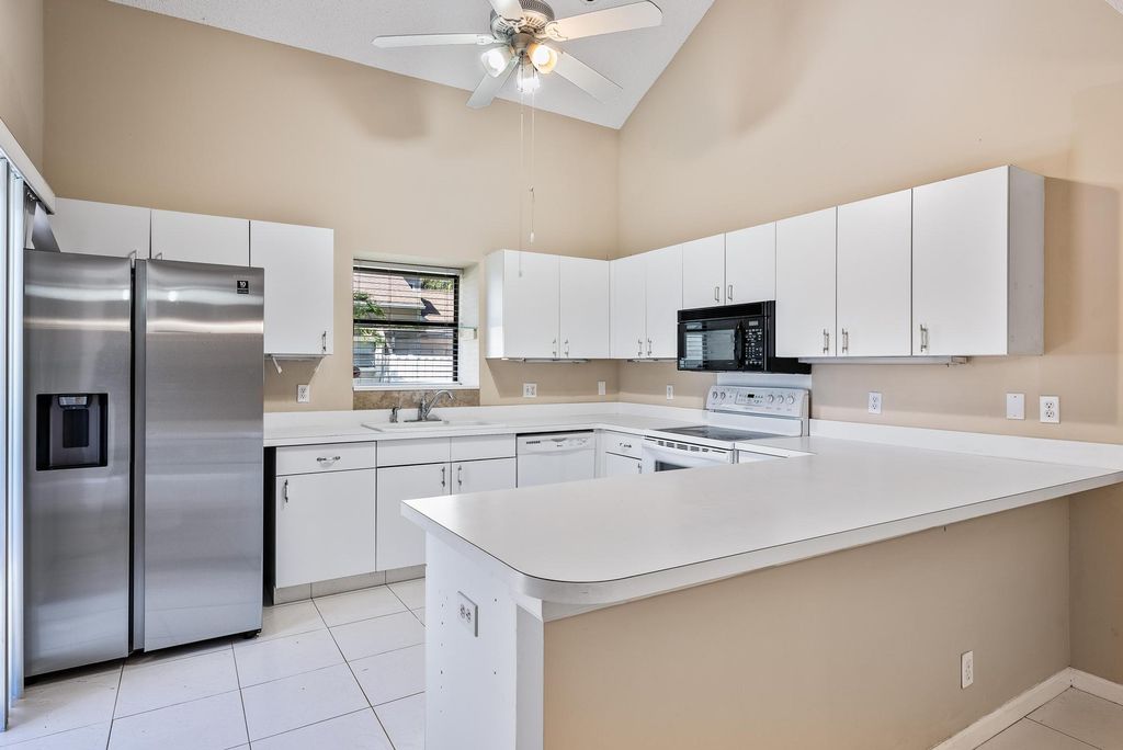 Photo of 1102 Summer Winds Lane #1102, Jupiter, FL 33458 (MLS # R11000455)