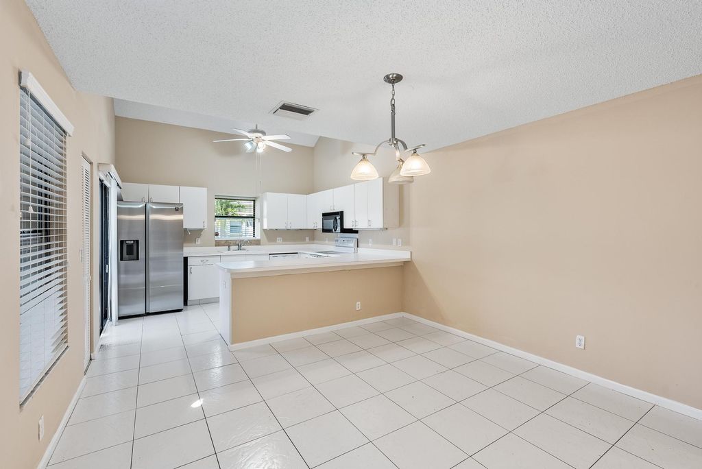Photo of 1102 Summer Winds Lane #1102, Jupiter, FL 33458 (MLS # R11000455)
