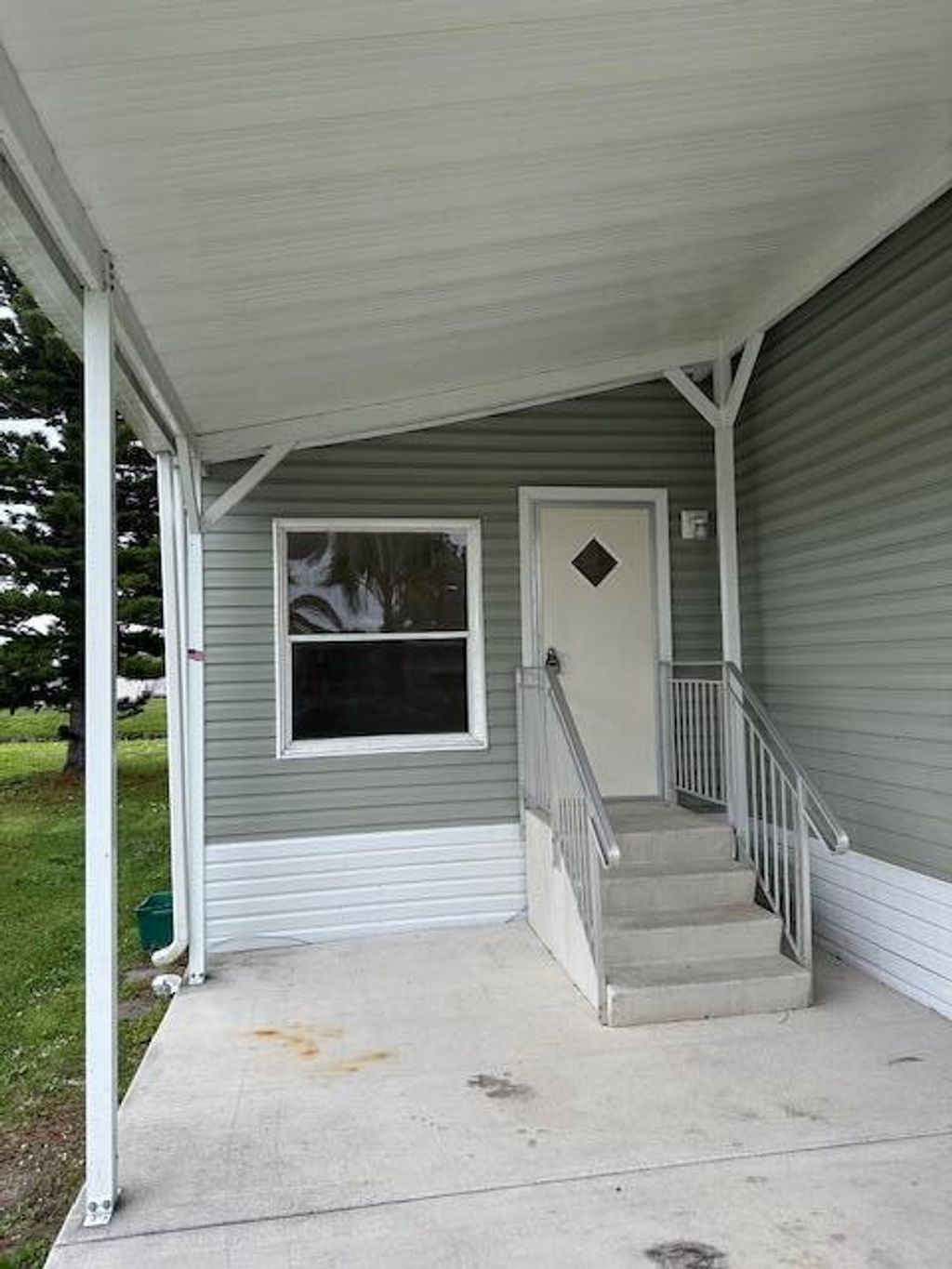 Photo of 33 Mariposa Lane, Port Saint Lucie, FL 34952 (MLS # R10966471)