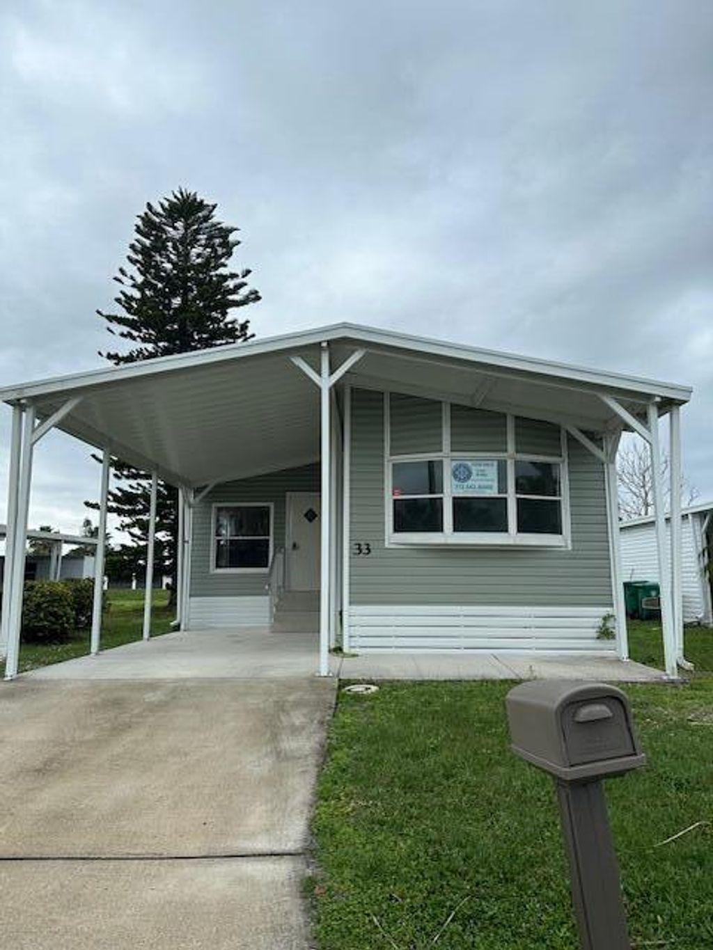 Photo of 33 Mariposa Lane, Port Saint Lucie, FL 34952 (MLS # R10966471)