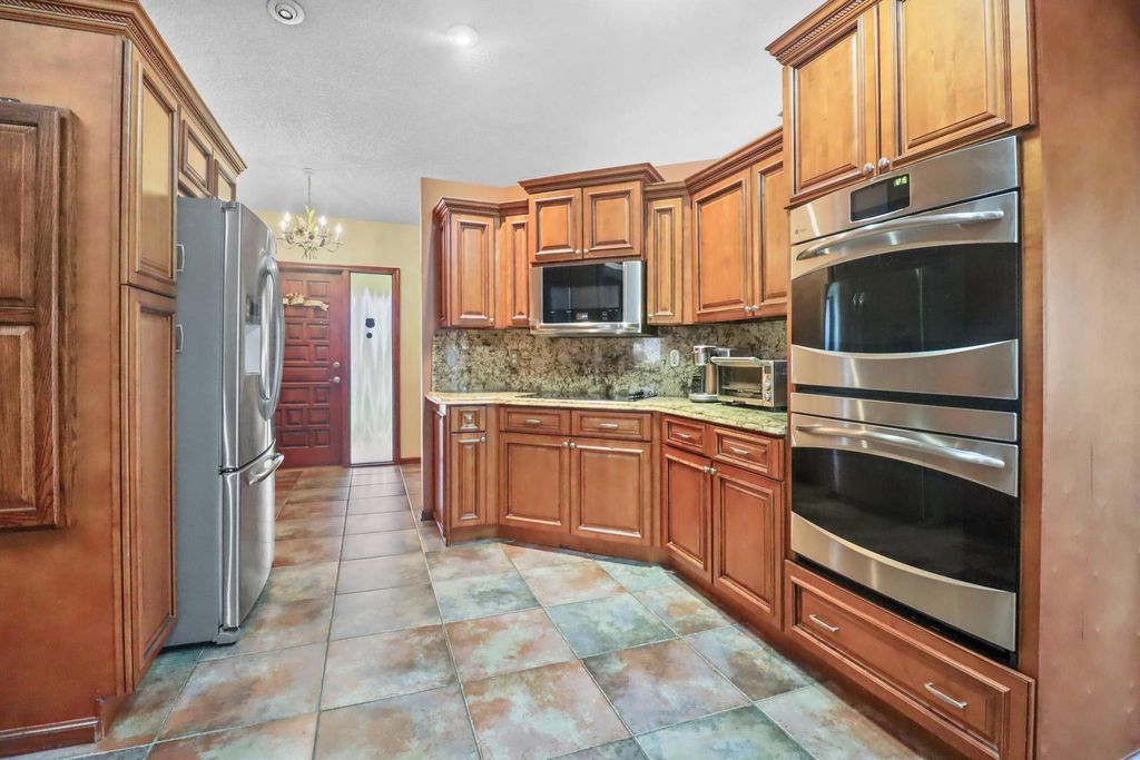 Photo of 655 Oleaster Avenue, Wellington, FL 33414 (MLS # R10972110)