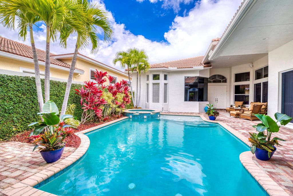 Photo of 810 Floret Drive, Palm Beach Gardens, FL 33410 (MLS # R10951937)