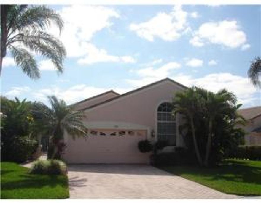 Wow, you won't believe your luck. You've found the largest home in Cambridge with an open great room style floor plan. Light and Bright with panoramic golf course views, from almost every room. Don't delay, Call today! Sunshine and rolling golf course views will greet you from the moment you walk through the doors, in this spacious 2 bedroom, plus family room, 2 bath residence. Located in Cambridge at Wycliffe Country Club, you'll enjoy all the amenities you would expect here in the heart of West Palm Beach. The paver patio screened area surrounds this home on the golf course, with an open kitchen counter, and breakfast bar leading to the dining room, featuring neutral wood blinds. Living room has mirror wall with wood trim, reflecting the golf course views. Continued... Enjoy a phantom screen in the entrance, and fully tiled living areas, with carpet in the bedrooms. The master bedroom has glass doors to the covered patio and floor to ceiling sliding doors providing lots of natural light, two large built in walk in closets, and expanded linen closet for plenty of storage. Master bath has skylight and Jacuzzi tub. Spanish S-style roof tiles, with matching decorative brick driveway and exterior motion security light. Enjoy two 18 hole PGA national golf courses, 16 har tru tennis courts, MGA & WGA Programs, Tennis Mixers, great dining, new fitness center & programs, spa services, card games, library, pools and a huge variety of social events. Best of all, it's only 20 minutes from Boca Raton and 20 minutes from P. B. Gardens all in the heart of beautiful Wellington, FL , just minutes from the West Palm Airport. Come see what you're missing, you'll be glad you did! I live here, I love it & so will you.